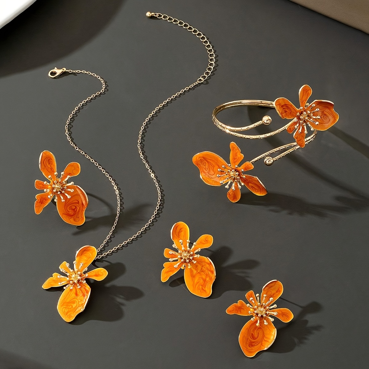 Image of Four-piece Women's Jewelry Set: New Pastoral Orange Drip Irregular Flower Pendant Necklace, Of Stud Earrings, 1pc Ring, And 1 Bracelet Set