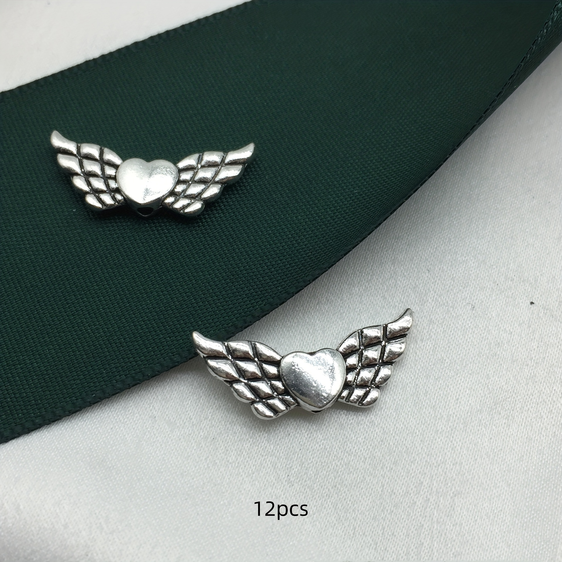 Image of 12pcs Antique Silvery Charm Heart Wing Spacer Beads For Diy Craft Bracelets, Necklaces, Jewelry Accessories 21x9mm