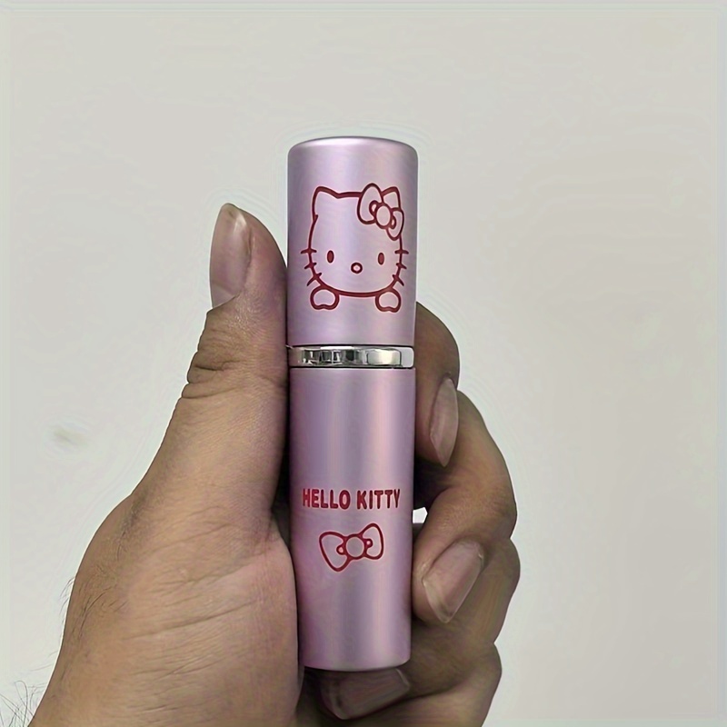 Image of Hello Kitty Pink Metal Spray Container - Adorable Refillable Atomizer For Fragrances & Liquids, Allergy-friendly, No Pvc, 0.34oz, Stylish Design Featuring Hello Kitty Bow, Scent Bottle