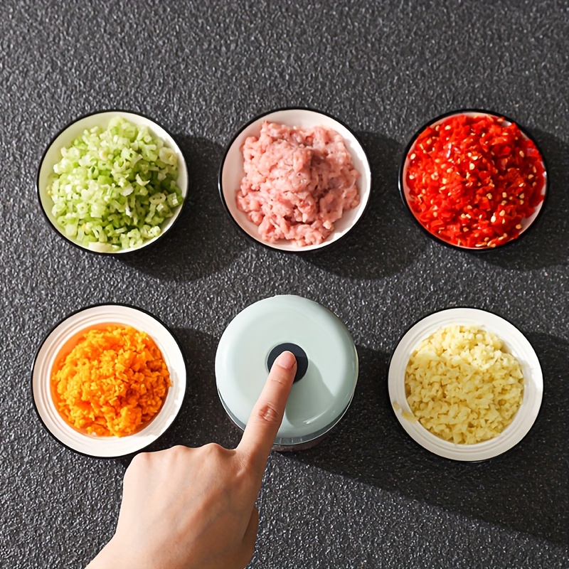 3 color options compact electric garlic press for home and restaurant use with stainless steel blades quickly crushes garlic and ginger ideal for   food preparations Product details 2