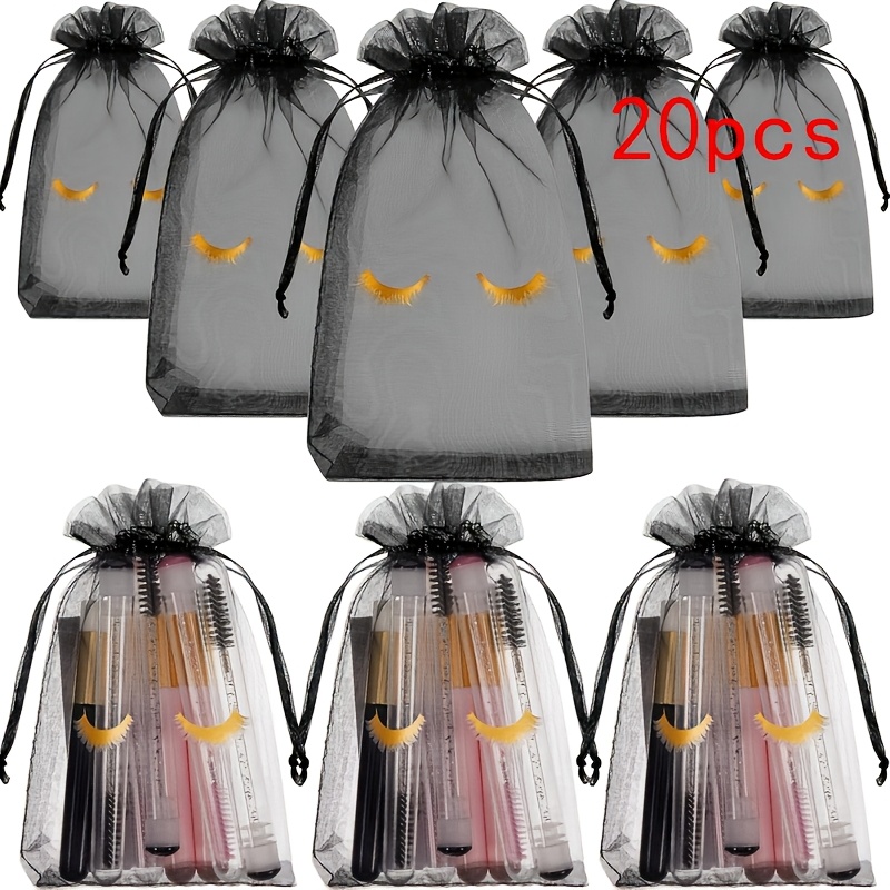 E-shop Geschenkset für Sie/Ihn, 20 Kordelzugbeutel für die Pflege von Wimpern, mit einem stylischen Wimperndruck. Diese leeren Geschenkbeutel für die