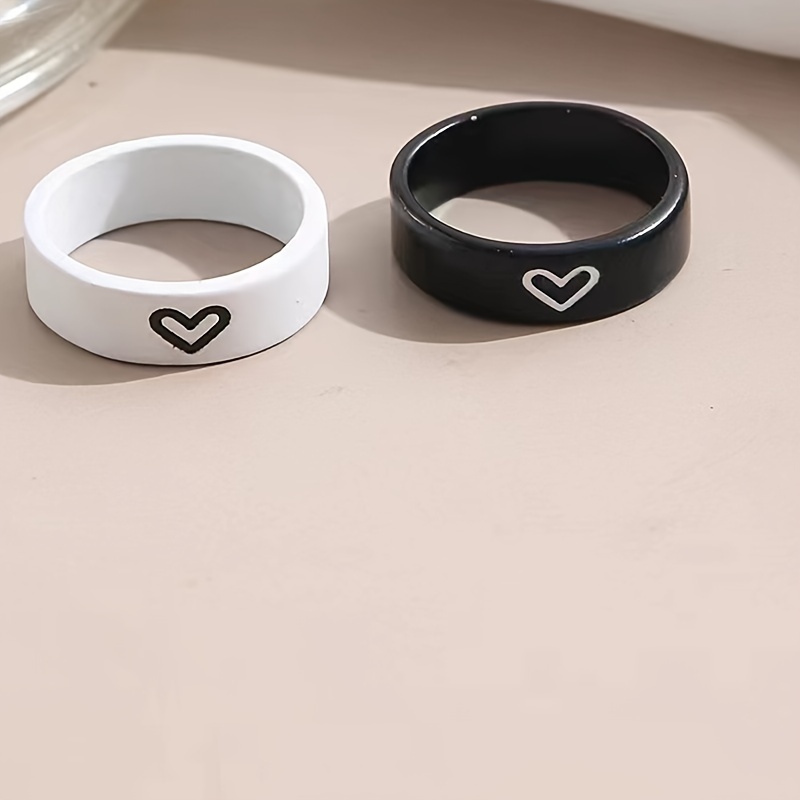 Anillos blanco best sale y negro