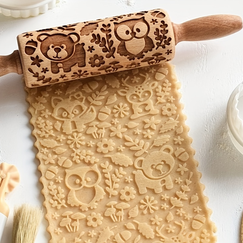 

Laser-engraved Rolling Pins In Lengths Featuring Small Animal Designs Like And , Baking Pizzas And Cookies.