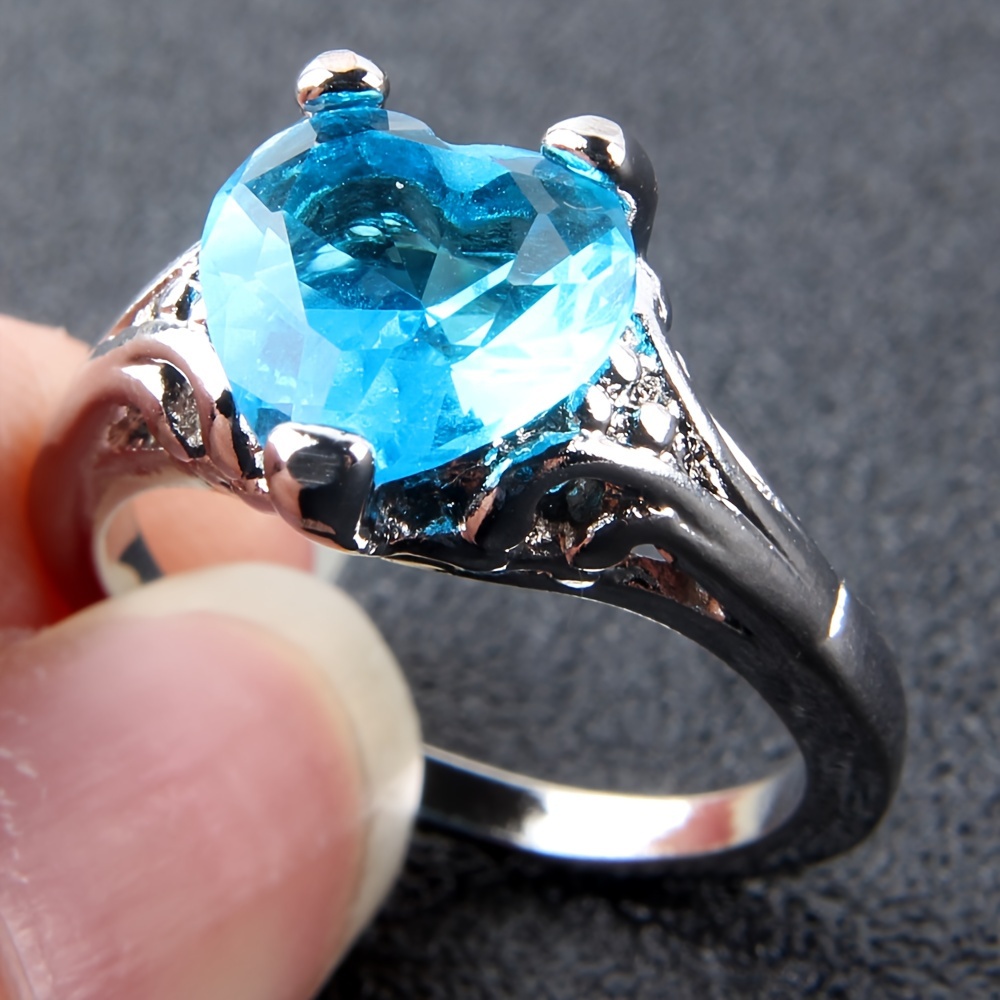 Blue stone wedding deals rings