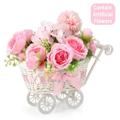 a rattan stroller floral arrangement featuring artificial flower bouquets suitable for use as a centerpiece for shower tables as a decorative piece in of a stroller and for gender reveal parties wedding celebrations favors