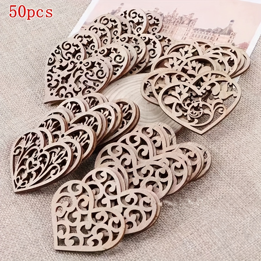 Image of 10/30/50pcs Of 2.08*2.08 Inch Wooden Crafts With Hollow Carved Floral Heart Designs, Hole Hangings For Handmade Decorations, Home Decor Pendants, Party Decorations, And Rustic Wedding Decor