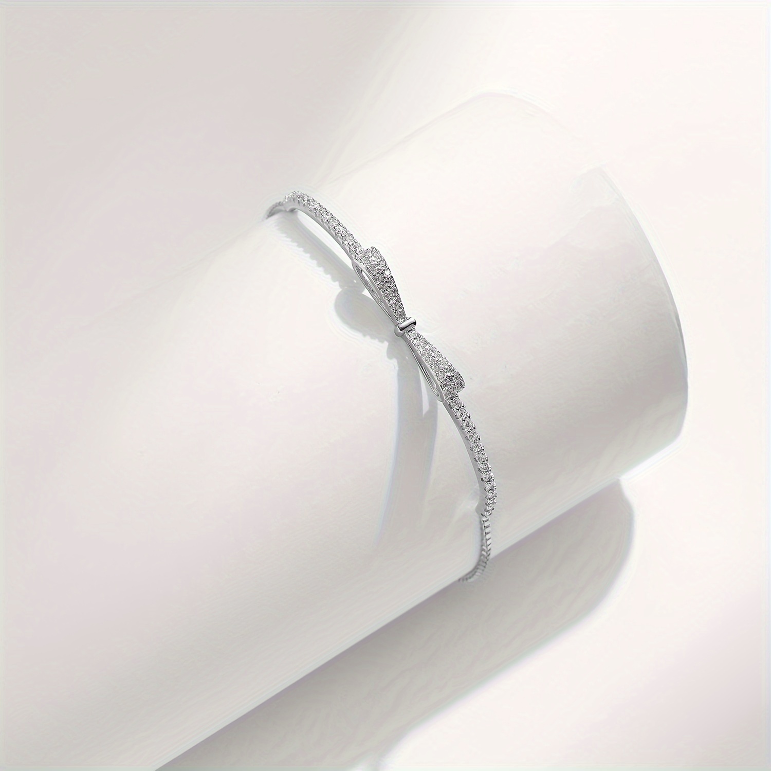 Sterling Silver Bow Bracelet CZ December Birthstone