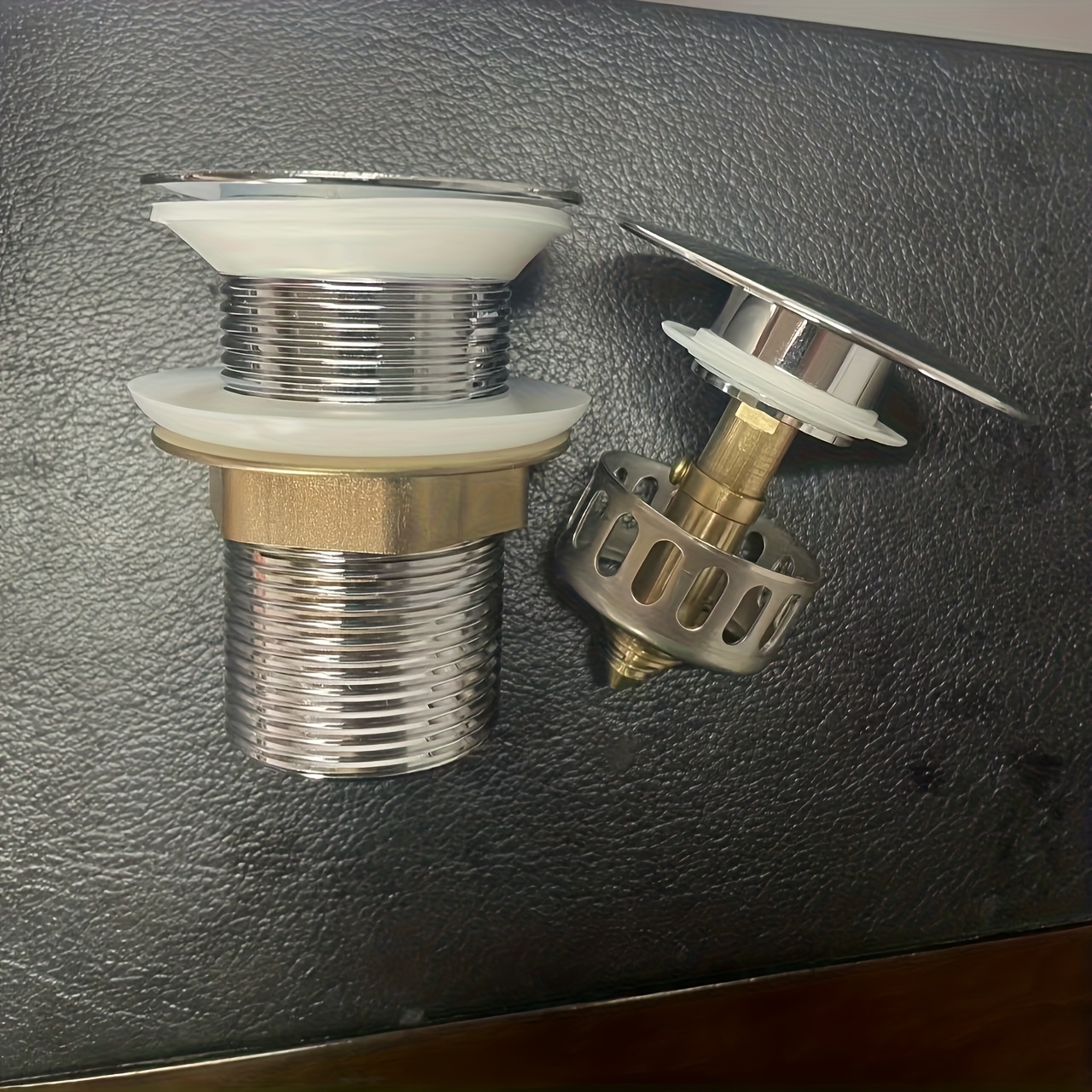 Stainless Steel Pop-Up Sink Drain Stopper with Painted Finish, Suitable for Bathroom and Kitchen Drains, Manual Operation, Matte Black, Golden Pull, Electroplated Silver, Available in Three Colors