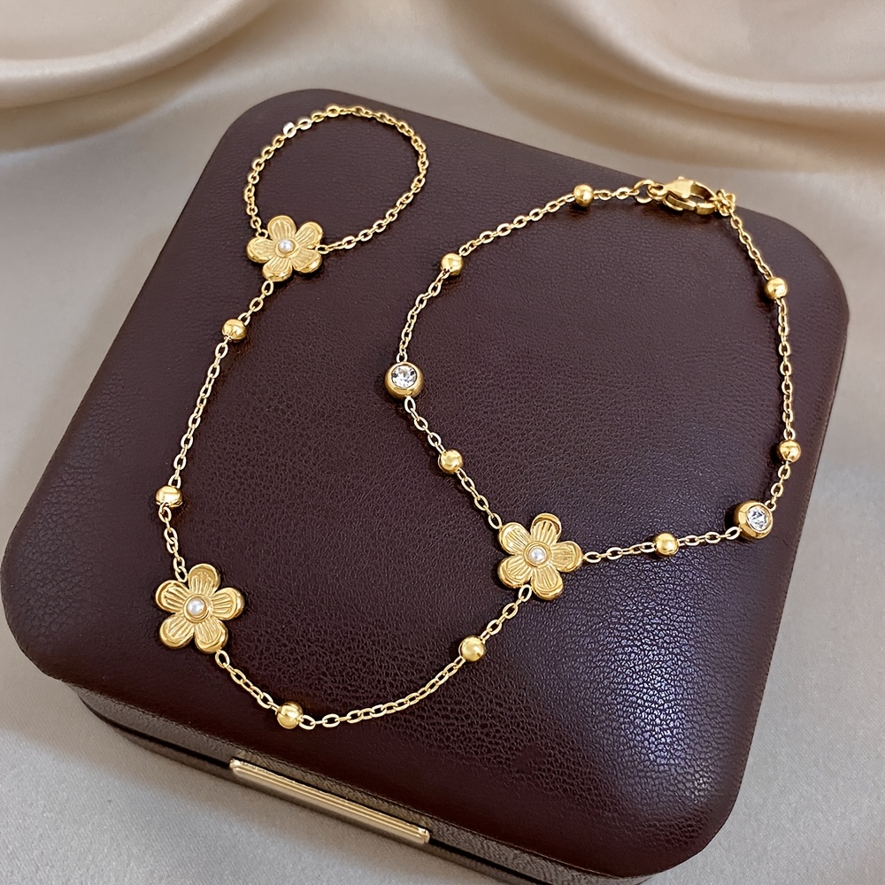 Women's Plum Blossom Finger Chain Bracelet with Synthetic Zirconia