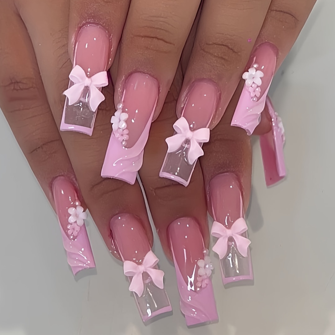 

24-piece Press-on False Nail Set Long Square Shape In Pink And Clear With 3d Bow, Floral, And Water Design, – Includes Jelly Adhesive And Nail File For