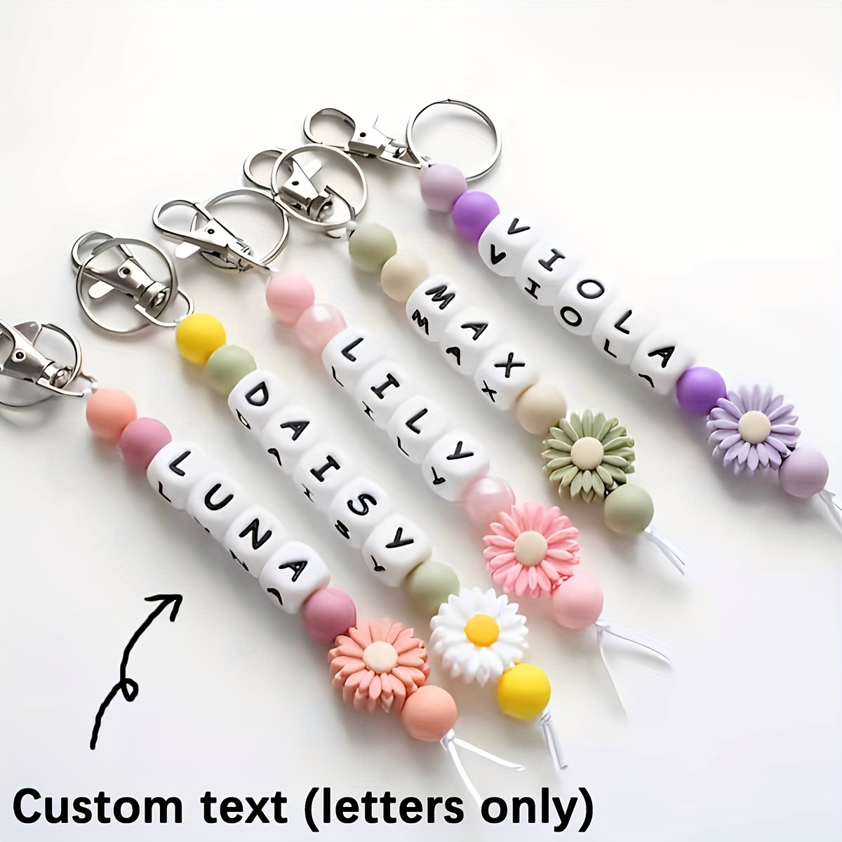 letter keychain sold on Temu United States