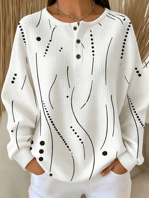 photo de l'article haut à manches longues pour femme de style européen et américain, t-shirt élégant et imprimé à manches longues pour tenue décontractée et de