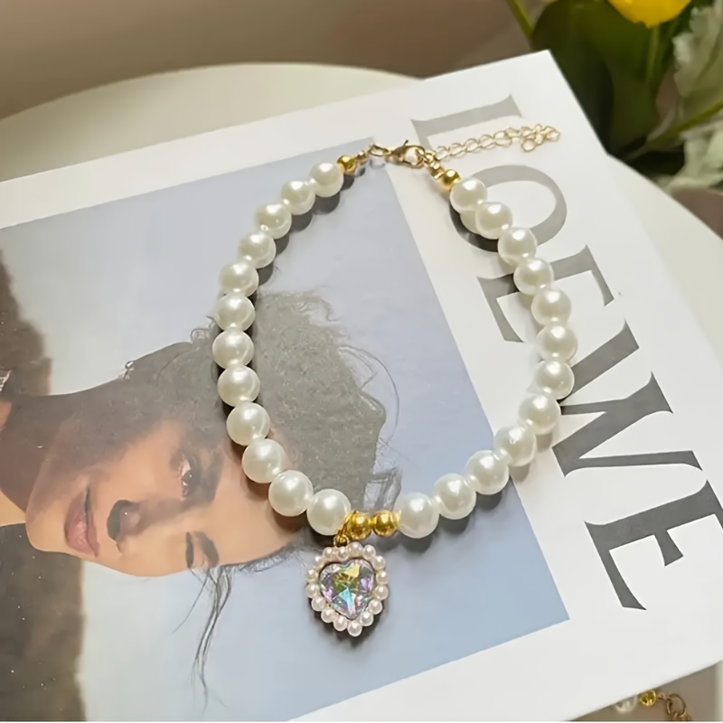 adjustable vintage pearl pet necklace with   pendant and bow charm elegant wedding accessory for dogs and cats holiday gift   fashionable design for special occasions pearl necklace Product details 4
