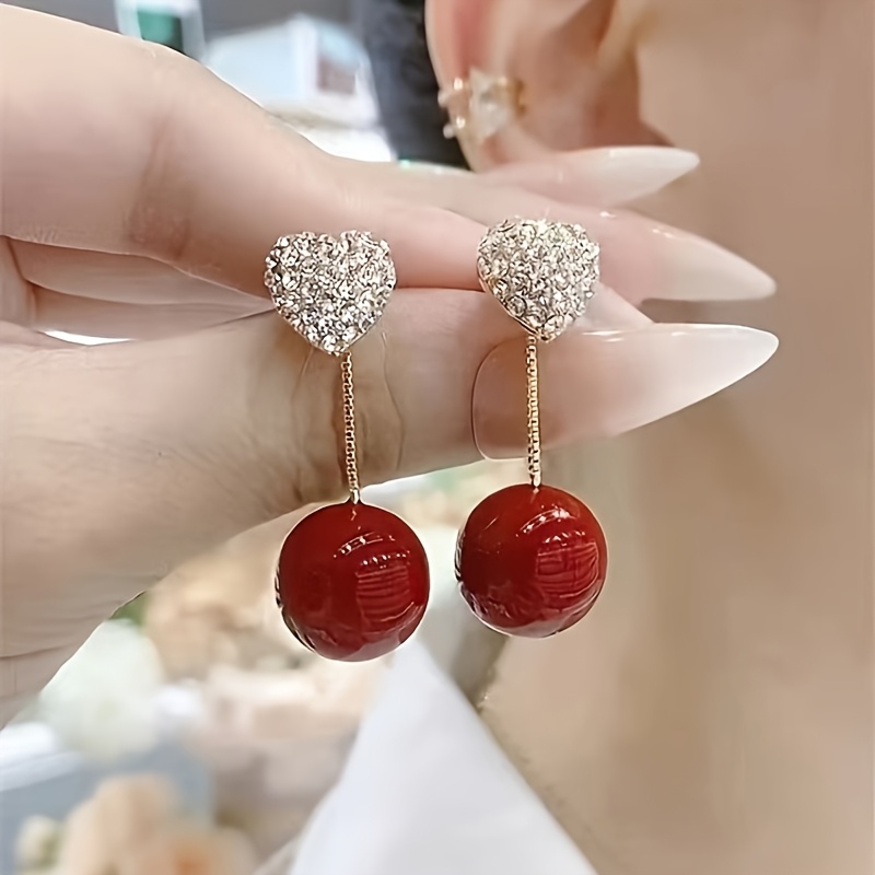 TEMU Elegantes pendientes de viento, un pendiente de perla de con forma de de amor para usar dos veces