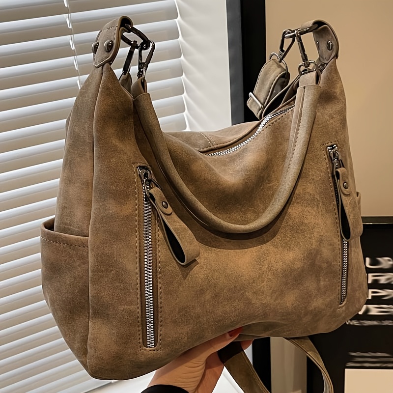 

Sac à bandoulière en simili cuir pour femme, couleur unie, style décontracté à , avec fermeture à glissière, bandoulière fixe, doublure en polyester, pour un sac à main polyvalent de Guangzhou