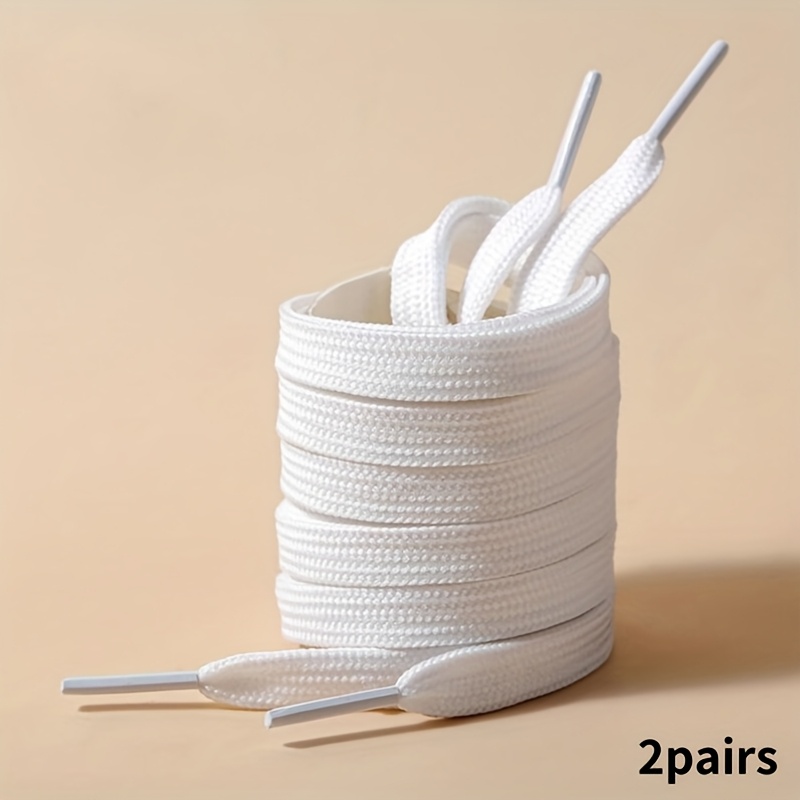   of soft sports shoe laces in   color featuring a double layer design   durable and easy to   ideal for sports footwear and shoe accessories   in black and white options