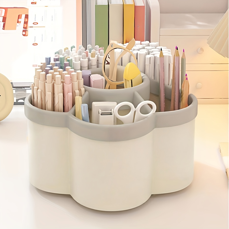 a rotating desktop organizer a pen holder multiple storage