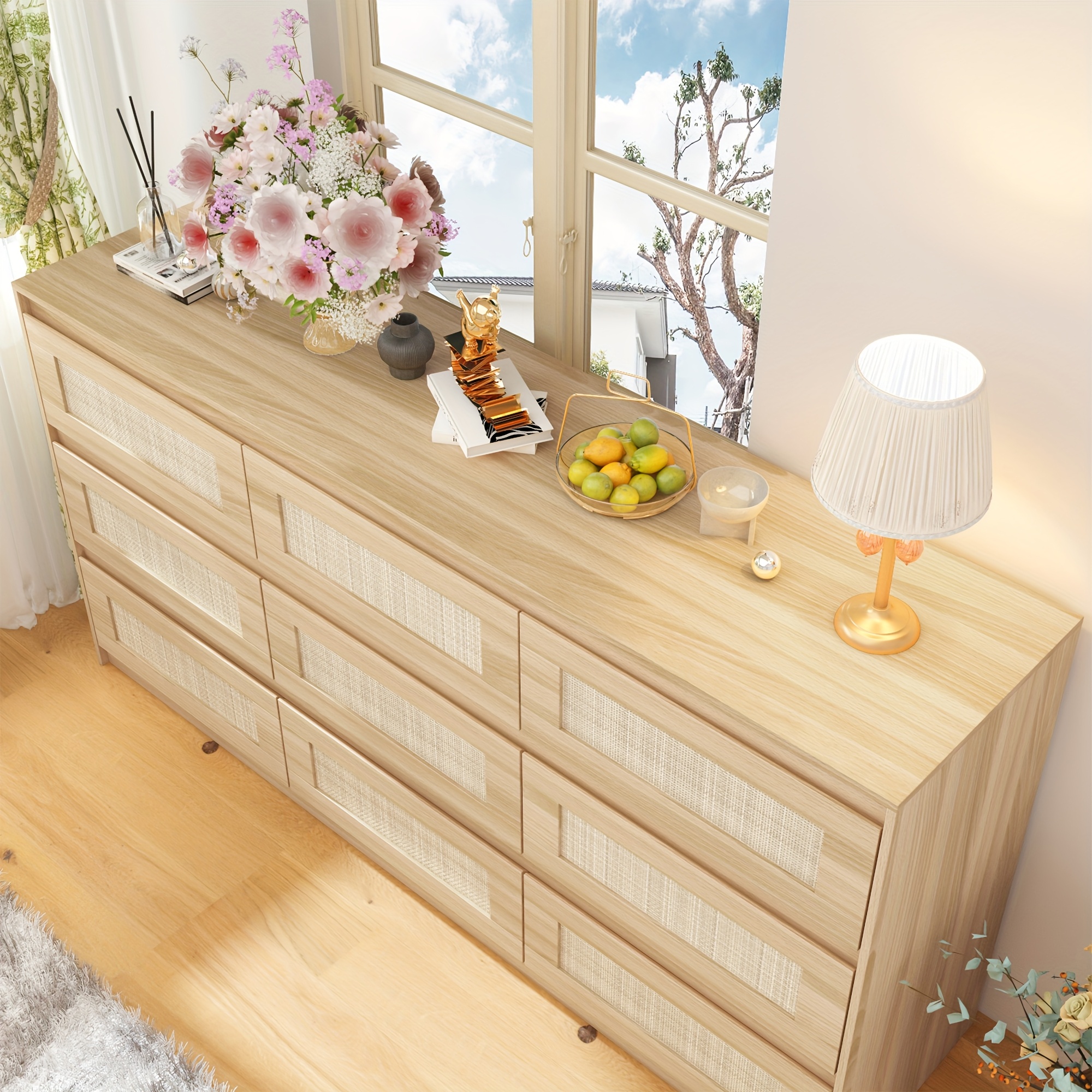 contemporary dresser with nine drawers featuring a chest of drawers with rattan paneling ideal for home use serving as a storage solution for bedrooms and living areas boasting a   and  