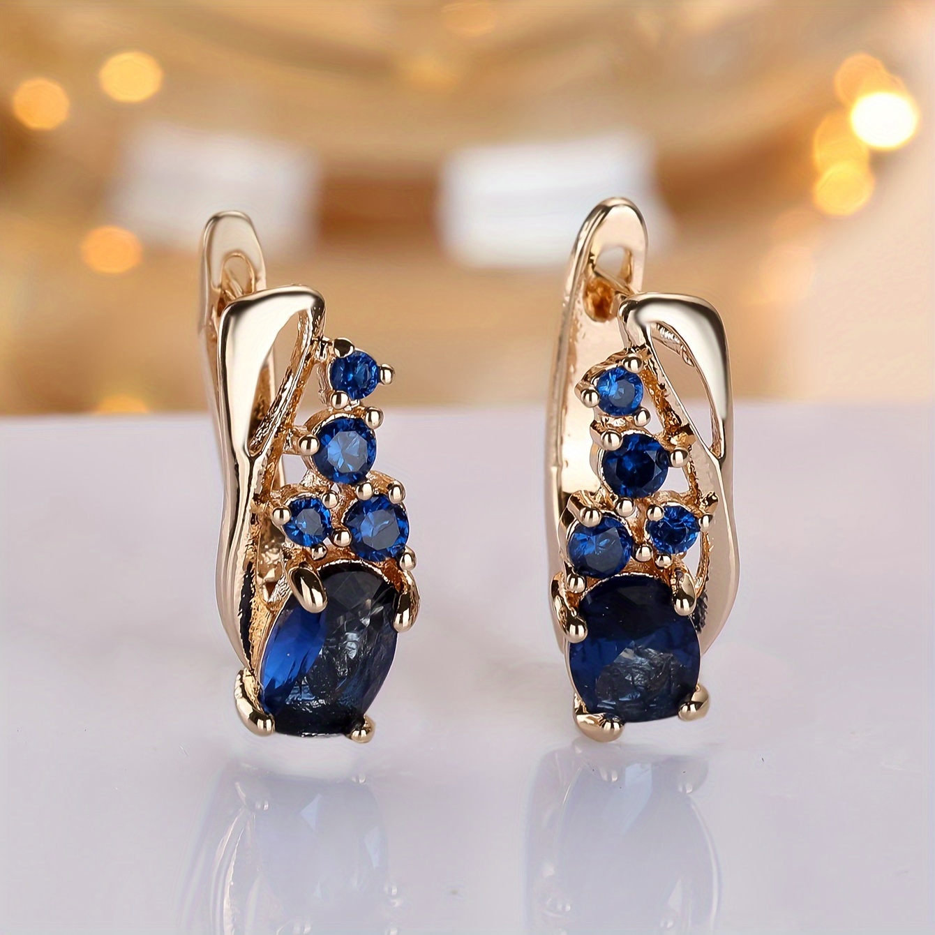 Image of Vintage-style Golden Earrings Shaped Like Stone Leaves, Perfect For Women To Wear At Parties Or Daily