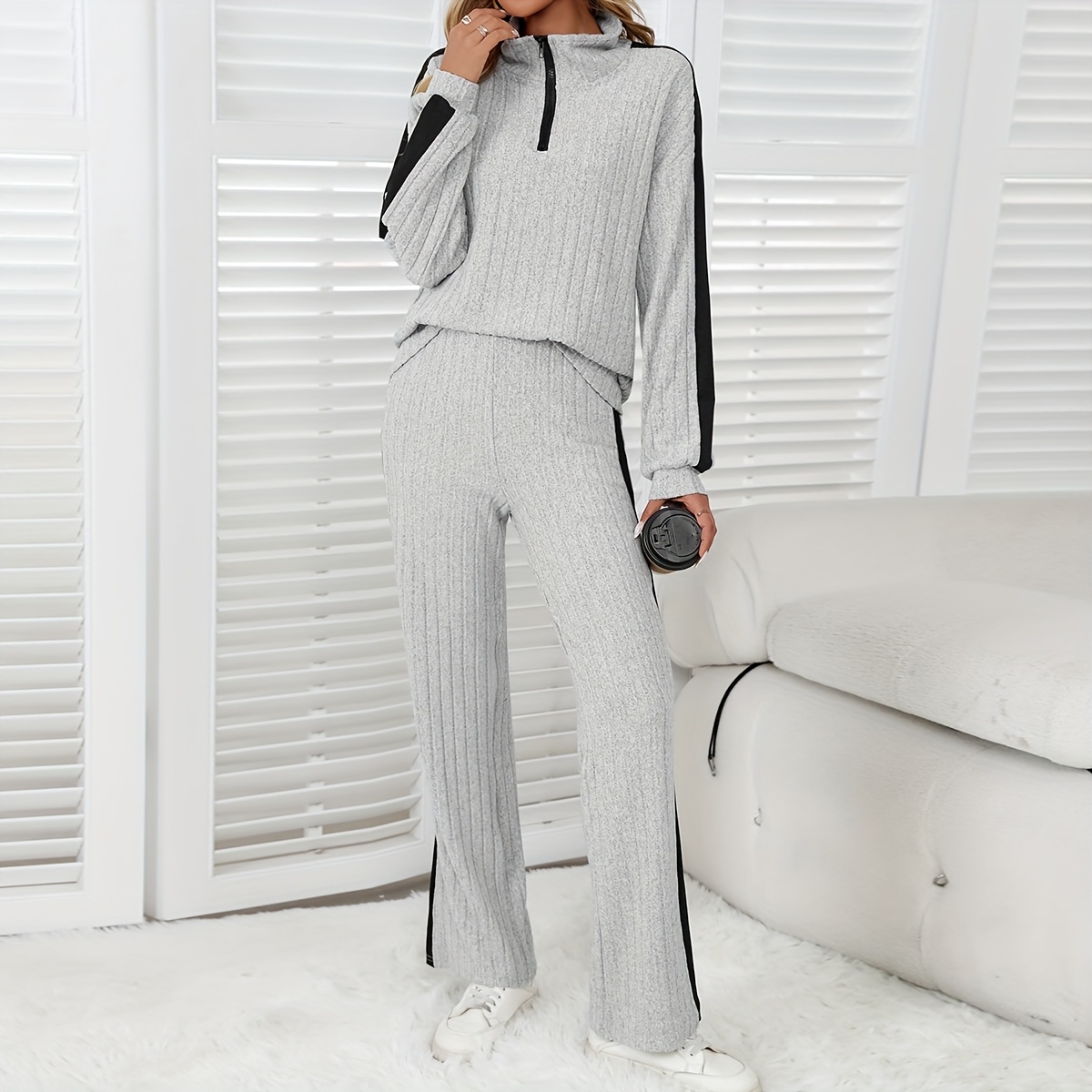 Model sitting, showcasing fit and high elasticity, image 3