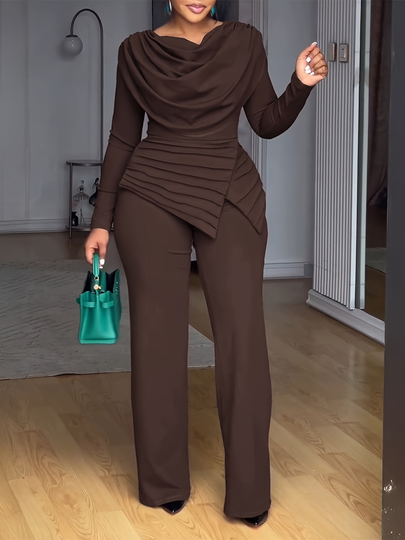 A Long-Sleeved Top with a Gathered Design And a Waist-Cinching Feature, Paired with Wide-Leg Jumpsuits