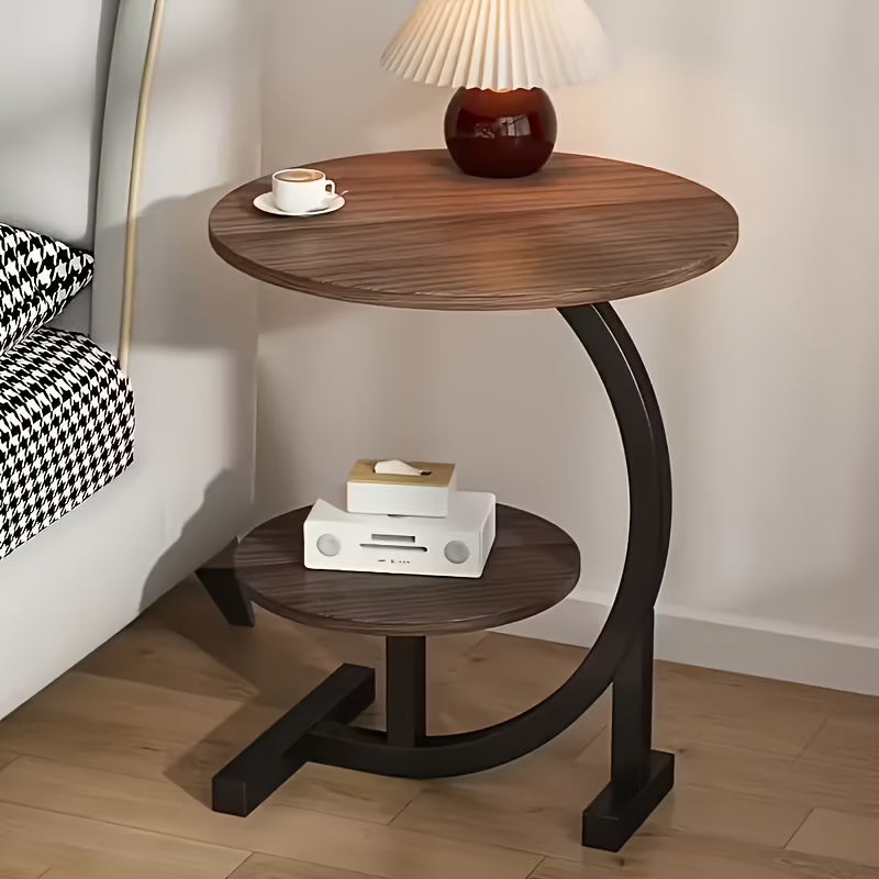 modern light luxury side table with sleek lines outlining an elegant     used in     such as the living room bedroom and balcony integrating the functions of a sofa side cabinet and a coffee table in one