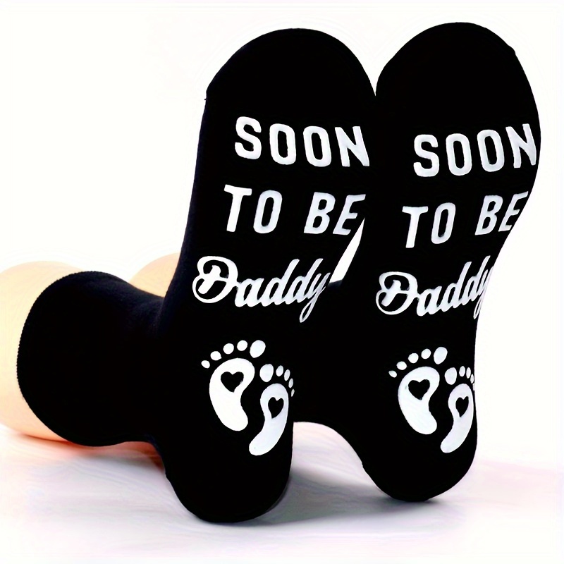 A Pair Of Black Mid-calf Breathable Cotton Socks For The -to-be New Dad