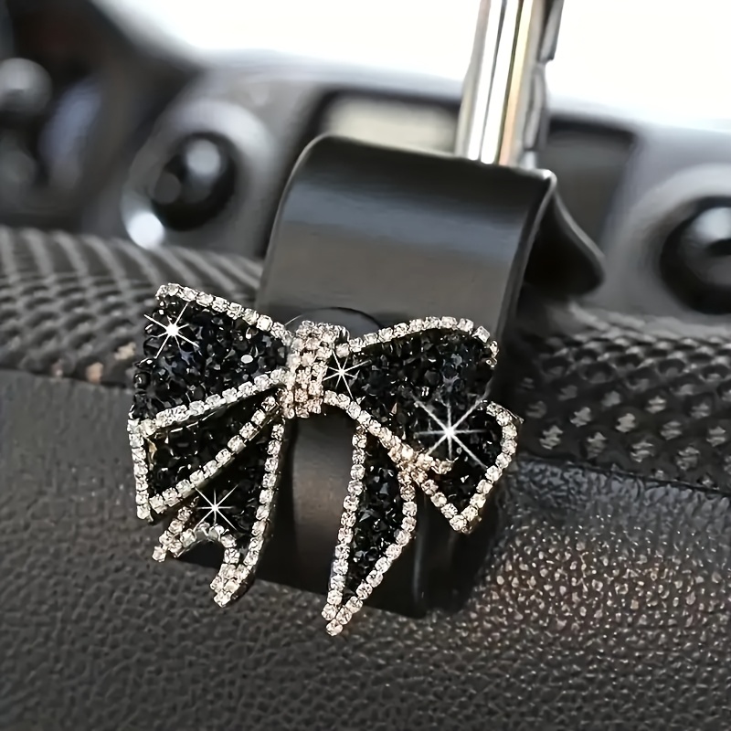 

1pc Crochet de voiture avec nœud en strass , organisateur de de siège de véhicule universel mignon, accessoire suspendu en résine ABS pour les paniers de courses et les