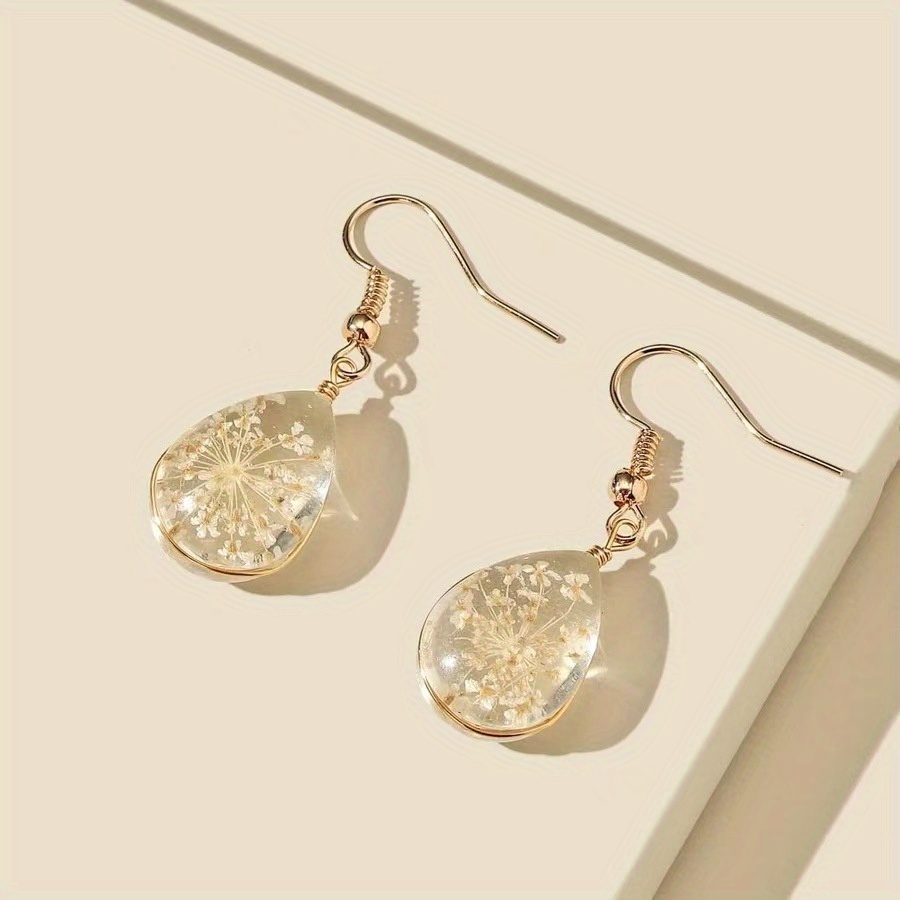 TEMU Un Par de Pendientes de Resina Ovalados con Flores Secas a - Elegantes, y Versátiles