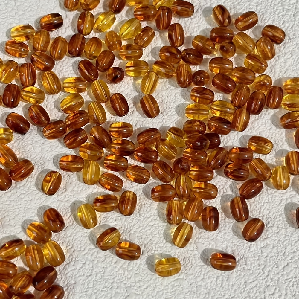 100 Colored Oval Beads for Jewelry Making, 6x9mm