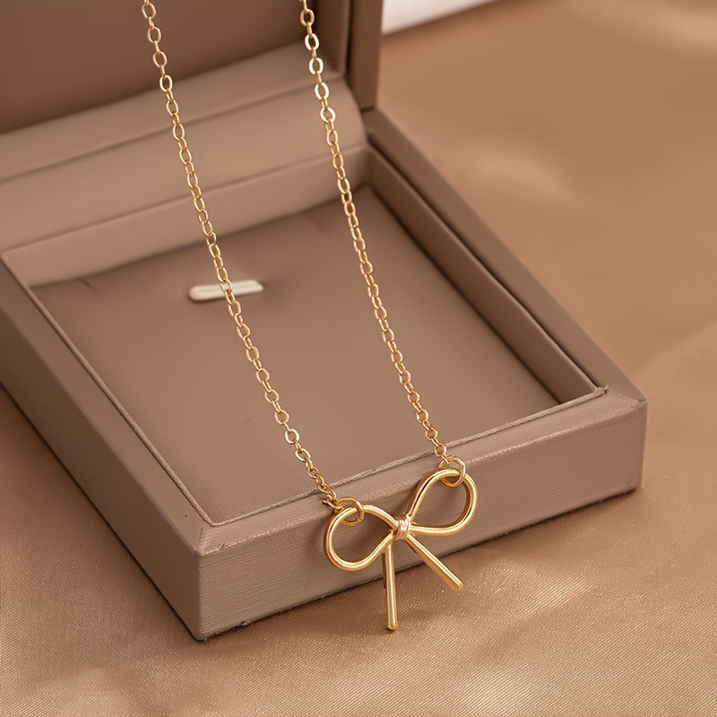 

Minimalist Bowknot Decor Necklace Hollow Out Bowknot Pendant Clavicle Chain Elegant Jewelry Accessories For Women