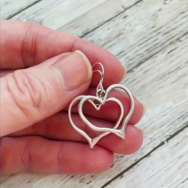 

Silvery Hollow Heart Shape Dangle Earrings Retro Simple Style Alloy Silver Plated Jewelry Valentine's Day Gift For Lovers