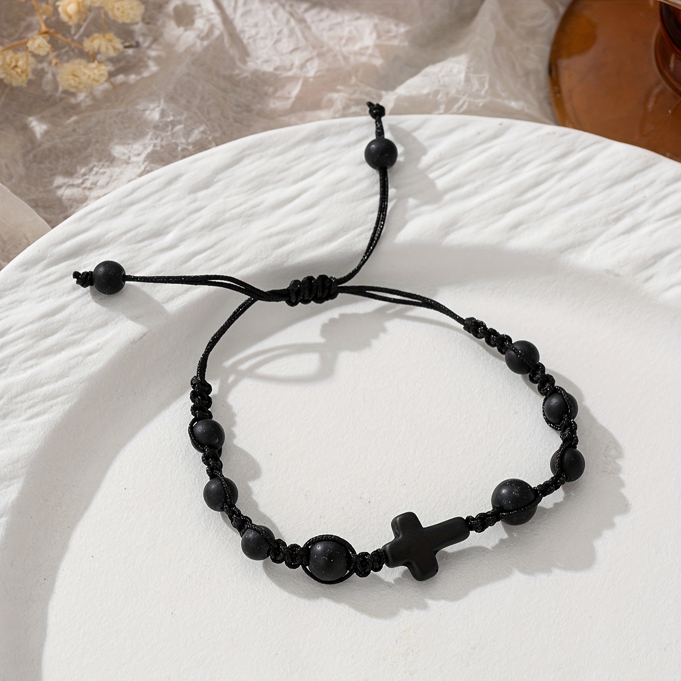 A Minimalist And Stylish Bracelet Featuring A Black Cross Stone Bead, Handcrafted And Adjustable, Wear Or As A Holiday Gift