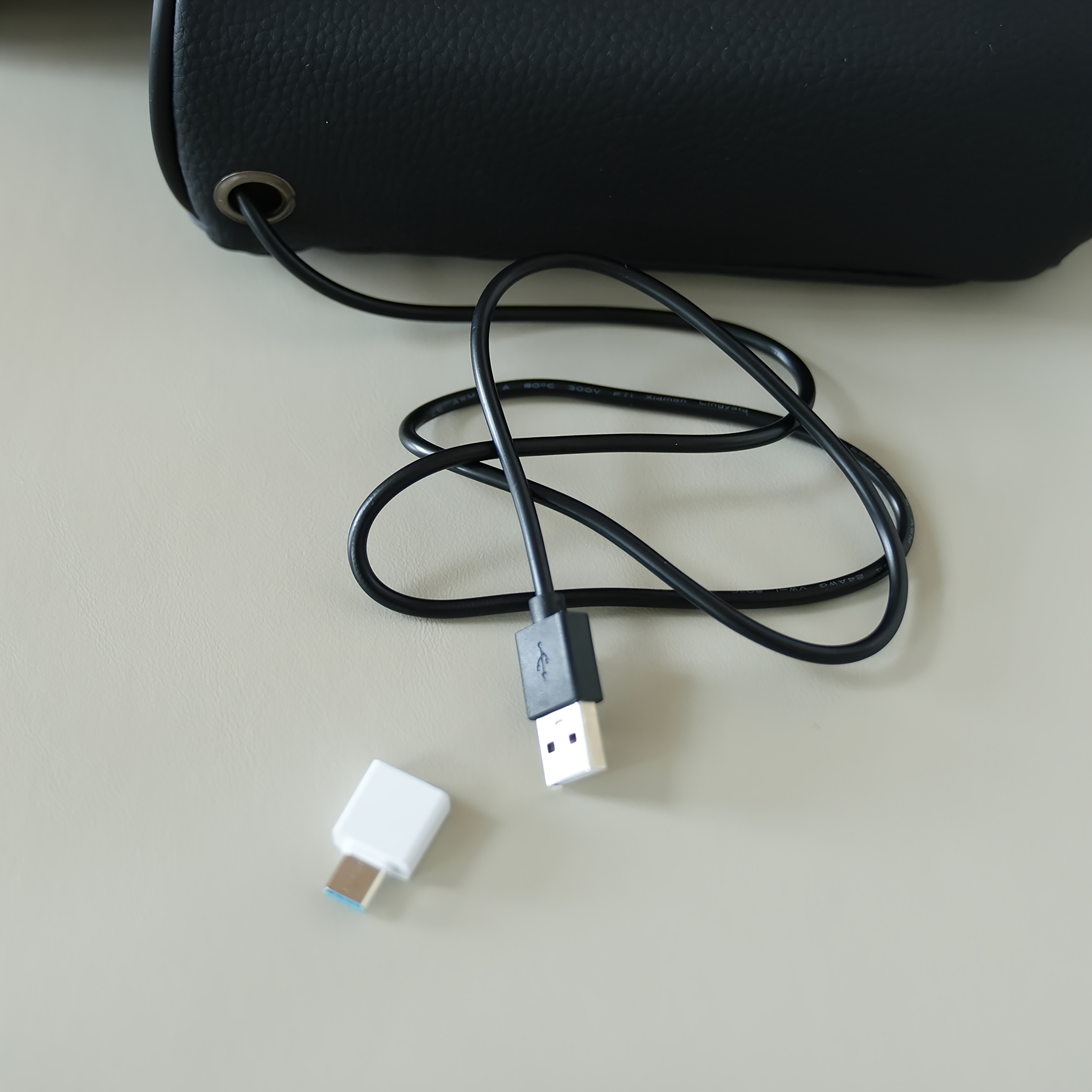 A Multifunctional Car Central Heightening Pad with a Dual Type-C Illuminated Data Cable Interface, Featuring a Storage Cup Holder And Armrest Box. It Includes a Thickened Memory Foam Console Protection Pad, an Armrest Storage Box with Pockets