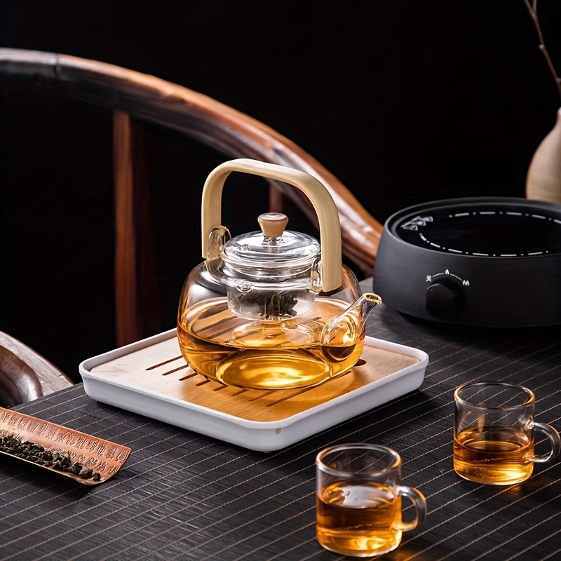 1 db 950 ml-es üveg teáskanna, alkalmas tea főzésére, használható nyitott láng fölé, átlátszó kávésüveg, bambusz fogantyú virágos teához, vízforraló elektromos kerámia tűzhelyre, teáskanna délutáni teához Termék részletei 0