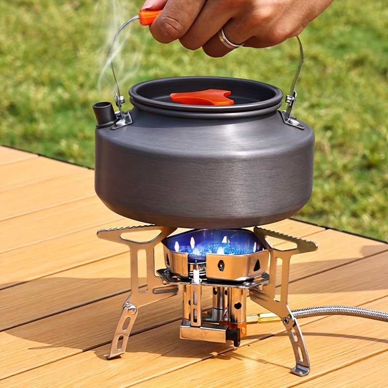 Estufa de camping con protección contra el viento cocinar comida