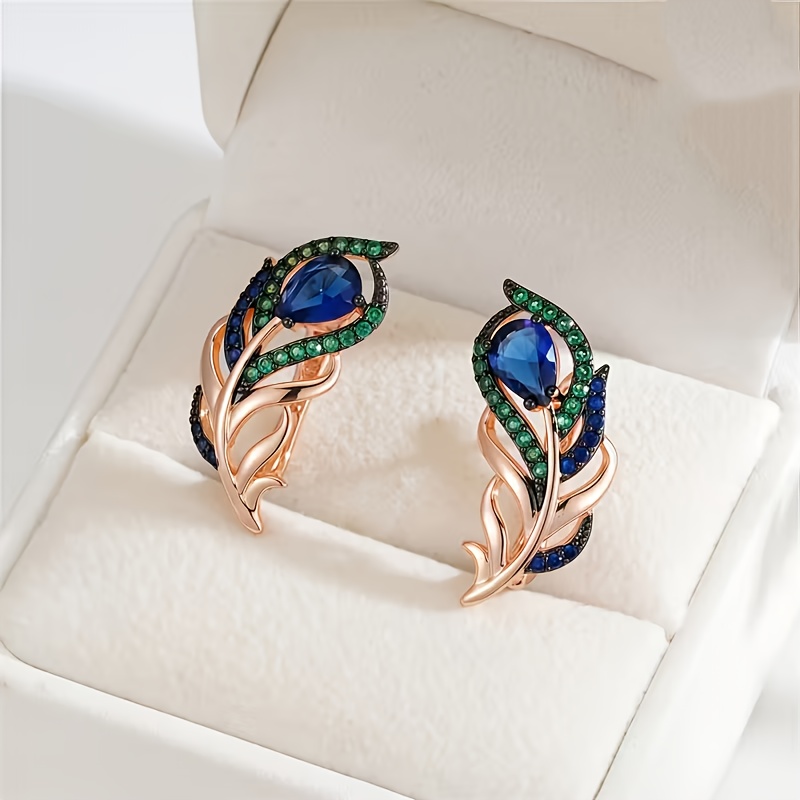 TEMU Un di orecchini eleganti e in stile boh矇mien con piume di blu e motivi , adatti per uso , e vacanze. Ideali come gioielli da sposa o come regalo