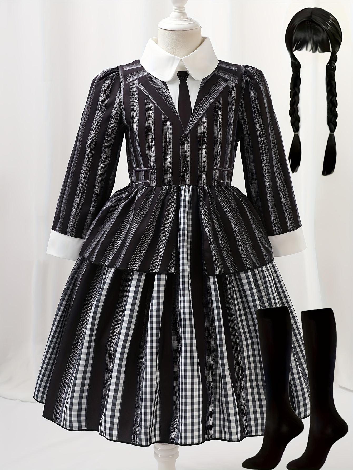*-Themed Dress for Girls * Halloween Performances, Featuring a Fitted Waist  And a Large Skirt. It * a Striped And Checkered *-Style Top (With a * Tie  And Collar) And a Multi-Layered Skirt