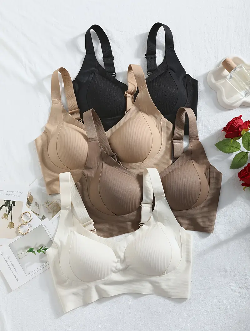 4pcs womens wire free soft bralettes medium support wide strap strapless bras with non removable padding elegant solid colors white beige everyday beige friendly fabric machine washable no underwire for sensitive light beige casual attire light exercise seamless design lifestyle Product details 0
