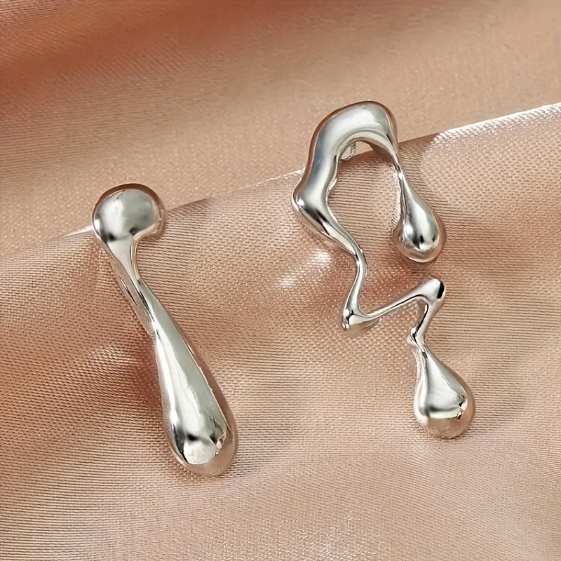 pair of hypoallergenic   steel earrings for women minimalist curved teardrop designs comfortable lightweight jewelry for daily wear parties summer mother s day gift versatile elegant accessories Product details 2
