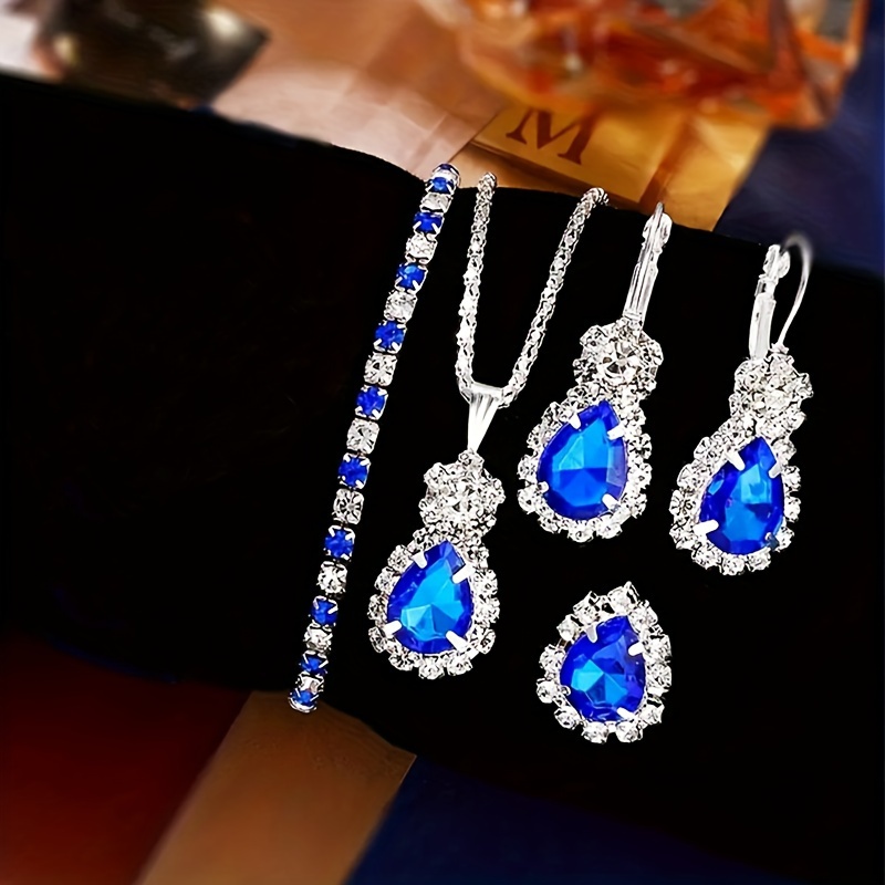 

Elegant 4-piece Jewelry Set For Women - Luxury Stainless Steel With Blue Rhinestones, Includes Teardrop Necklace, Earrings, Bracelet, Ring - Perfect For Weddings, Banquets, Valentine's Day Gifts