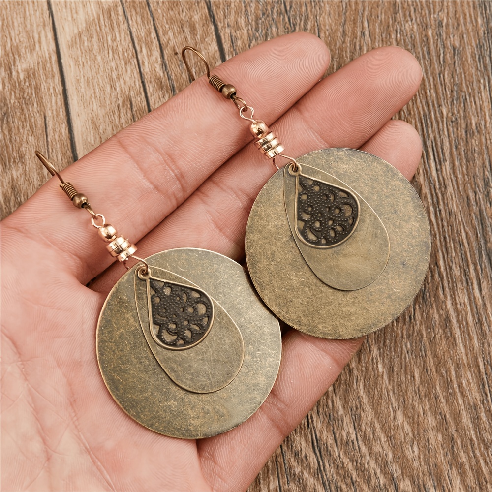 Image of Retro Bohemian Hollow Round Shape Dangle Earrings Alloy Jewelry Vacation Accessories For Women Girls