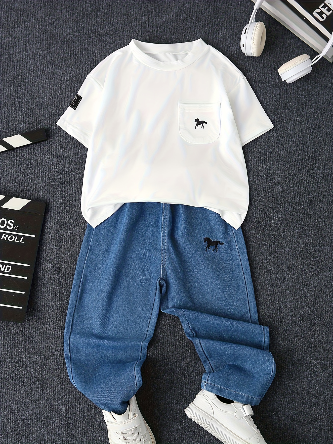   and versatile outfit for boys featuring a   print short sleeved shirt and pony embroidered denim trousers is perfect for daily wear for outdoor