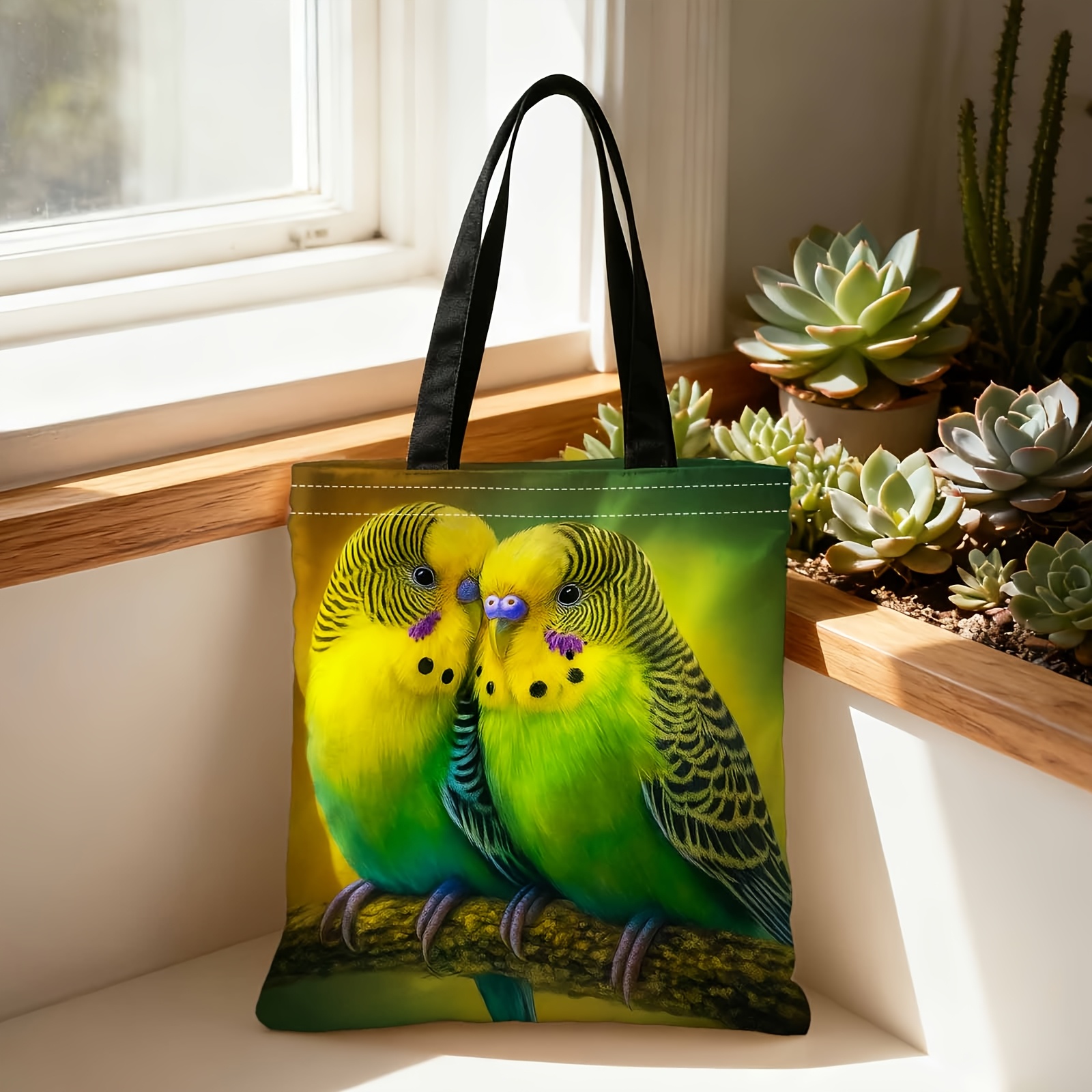 E-shop Eine Einkaufstasche, eine tragbare Tasche, die auf der Schulter oder in der Hand getragen werden kann, mit grünen und gelben Wellensittichen
