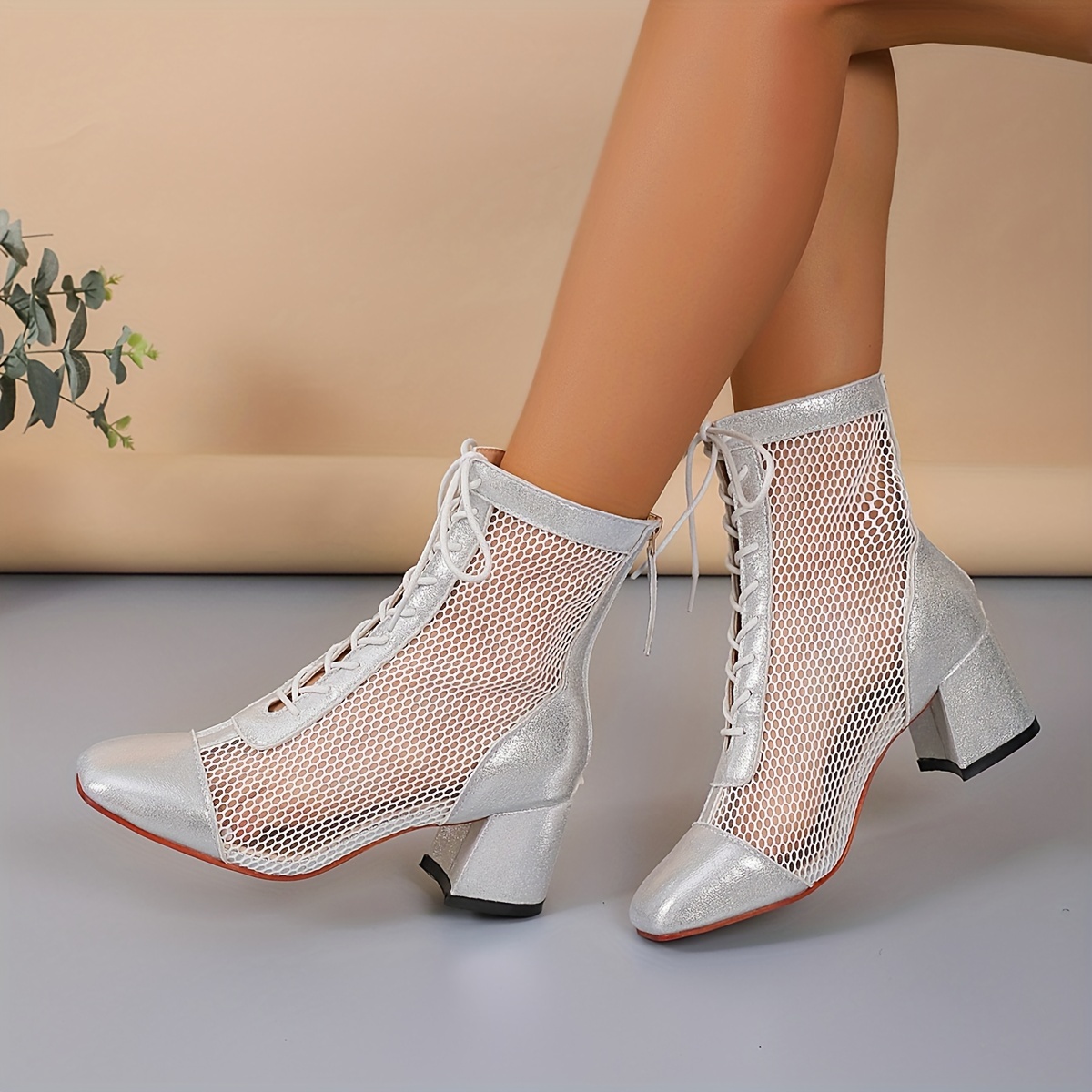 Fashion botines con tacon plateado