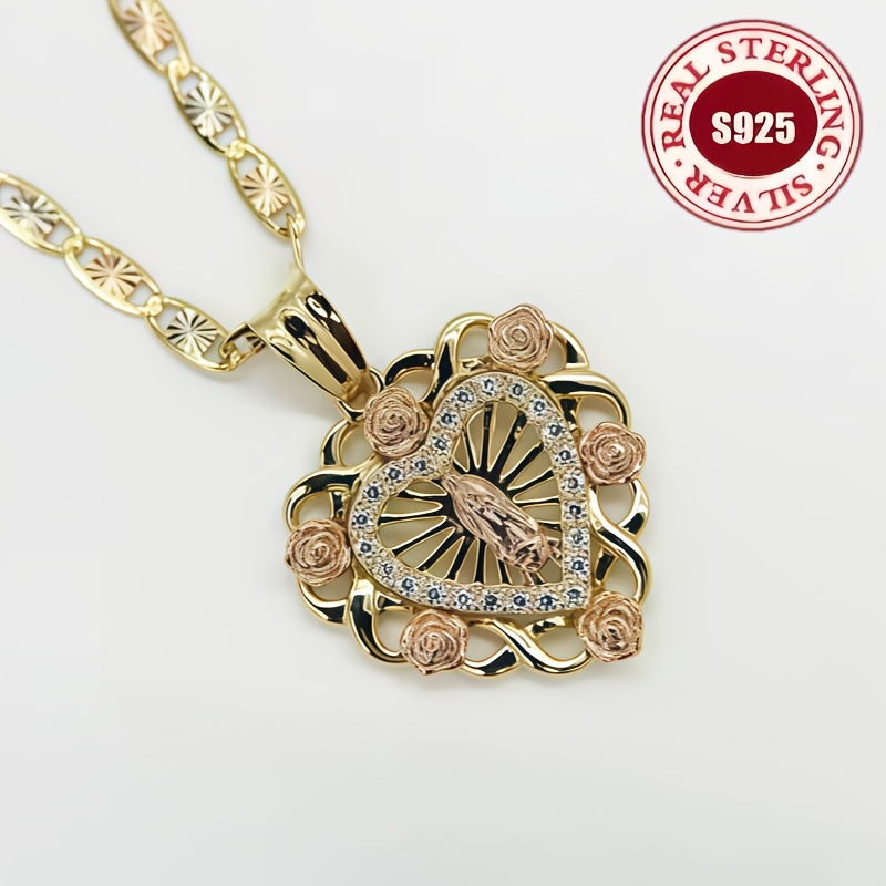 TEMU This Necklace Is From S925 Silver And Showcases A Heart-shaped Pendant Plated In, Featuring A Relief Of The, And With Synthetic Zirconia. Is