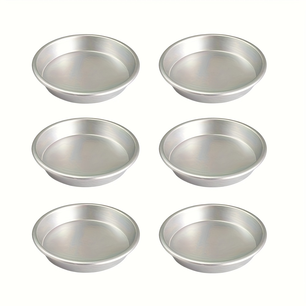 E-shop Set mit 6 fünf-Zoll-Runden Pizza-Teller aus Aluminium. Diese tiefen Pizzaformen sind mit einer stabilen Basis ausgestattet und zum Backen von