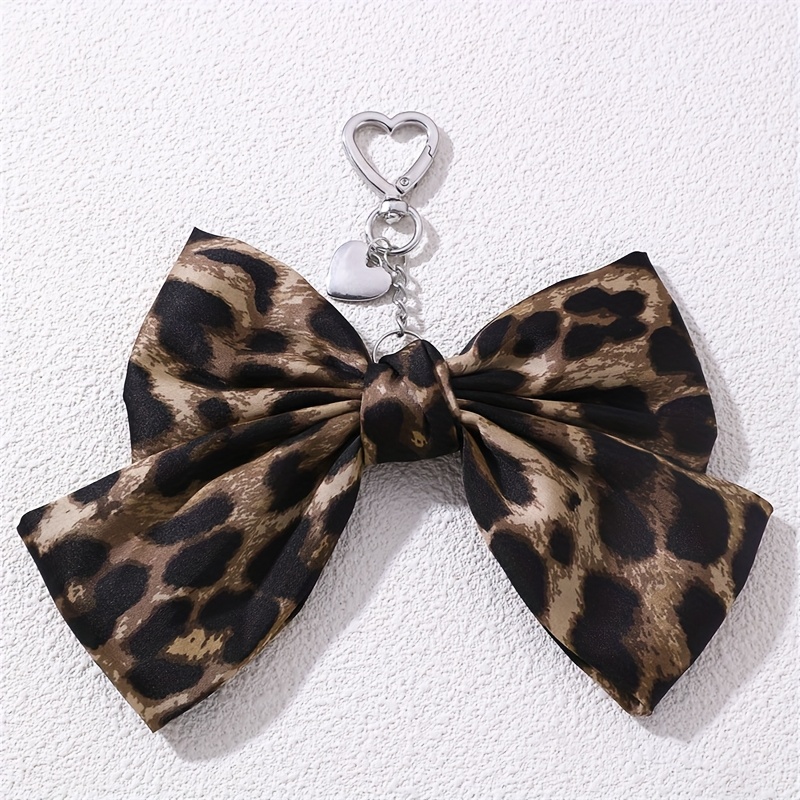 Image of 1pc Retro Leopard Print Bow Pendant Women's Fashion Keychain Bag Ornament Creative Fashion Streamer Key Chain Hanging Decoration Car Key Chain Suitable For Gifts
