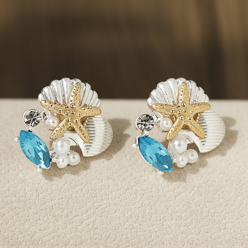 Image of Fashionable Earrings Designed With Glass Gems And Starfish , Featuring A Unique Shell-like Shape And , Perfect For Wear