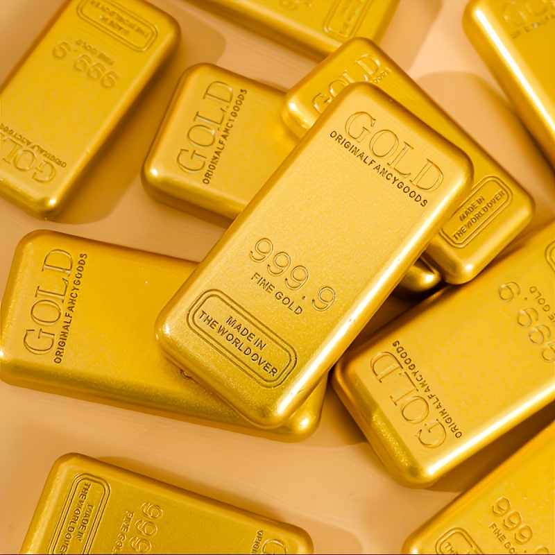 

A Brass Ornament Shaped Like A , A For Year.